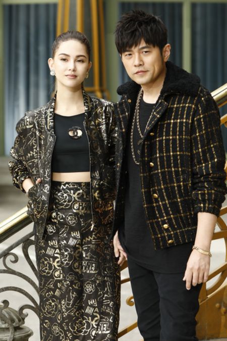 Hannah Quinlivan in a black dress with her husband Jay Chou.